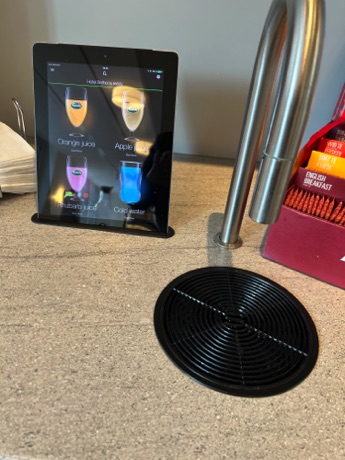 very modern juice dispenser at breakfast one morning; touch the display to select your juice